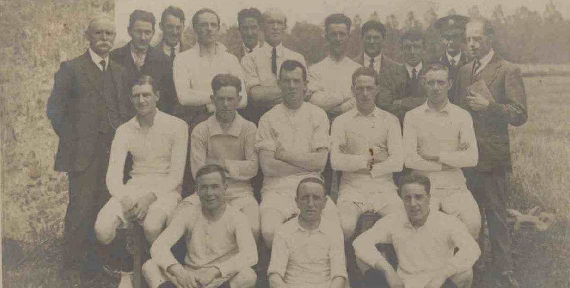 Post office baseball team from 1920s historic photo in sepia tones