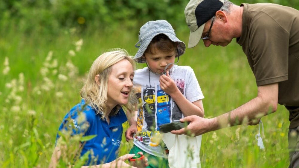 Park Rangers showing members of the public around.